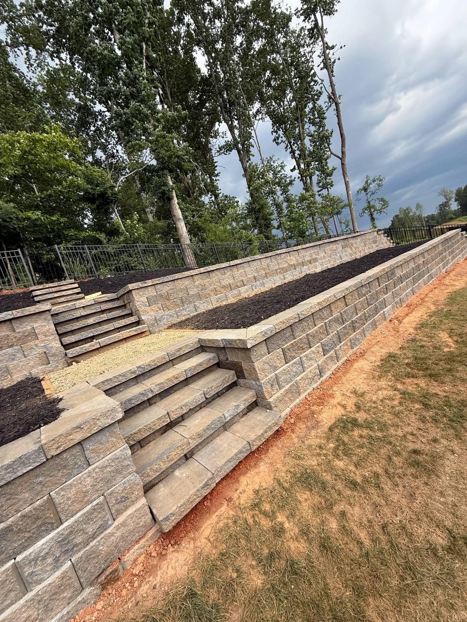 Finished tiered retaining wall with steps in Charlotte NC