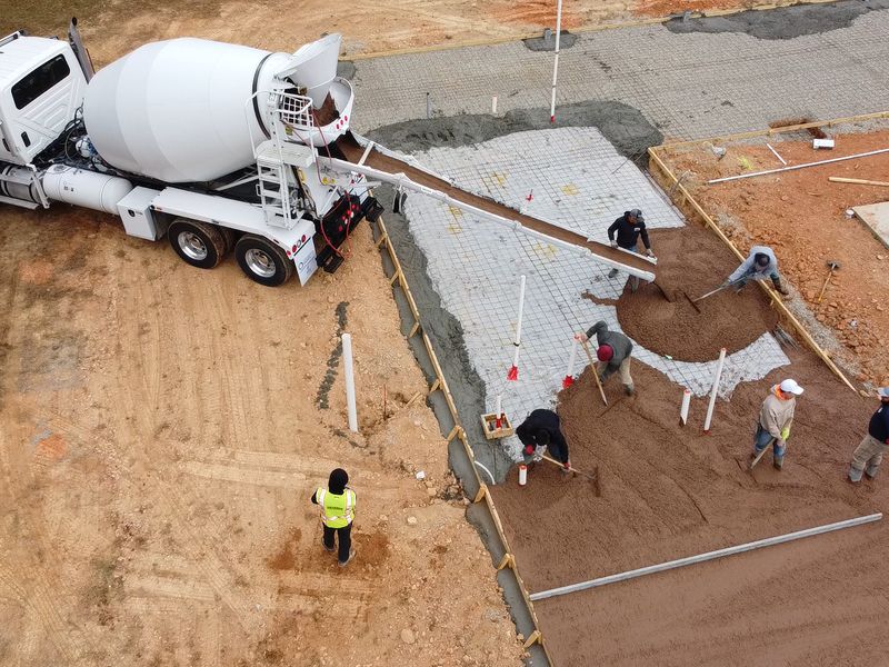 Concrete patio with broom finish for pool area Matthews NC - MCR Concrete